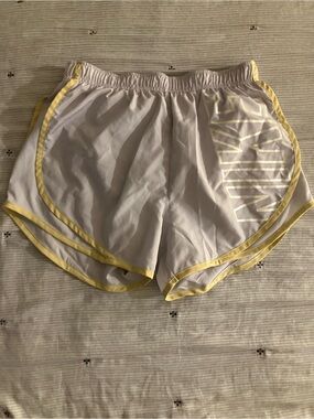 Nike Dri-Fit White Athletic Shorts with Yellow Trim